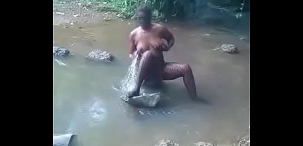 hot african woman taking bath